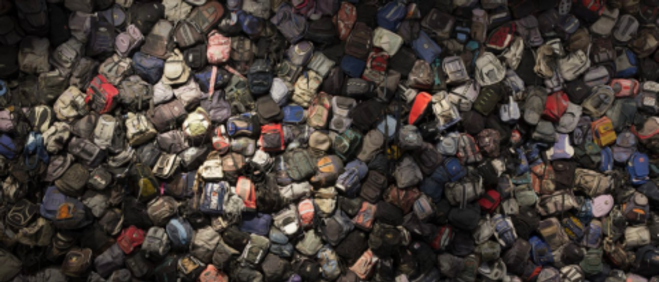 Exhibit of backpacks found along the Mexican border.