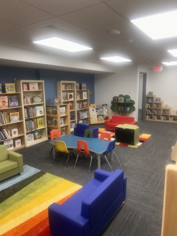 Towncrest Center’s Children’s Library stocked with books selected by Iowa City Public Library’s Librarians and paid for by the Iowa City Rotary Club