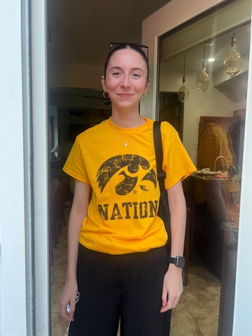 Patricia in with a Hawkeye shirt