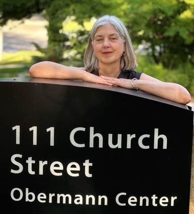 Teresa at OCAS sign