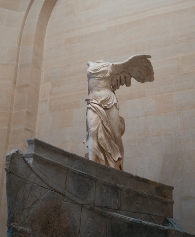 Headless, armless statue with wings