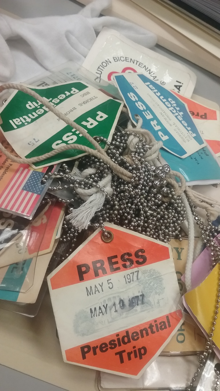 A tangle of many of press passes.