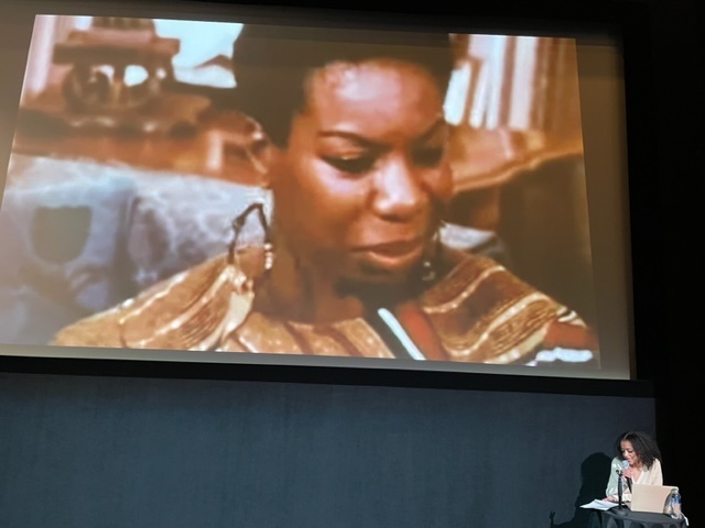 A black woman talking about a film about black women