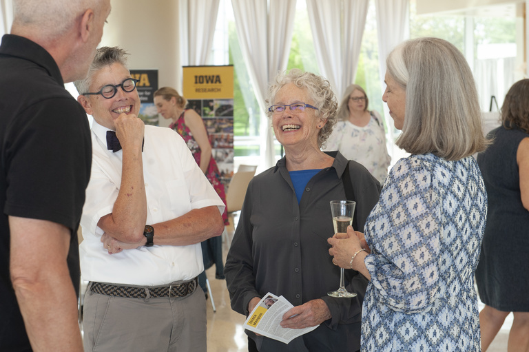 People chatting at reception