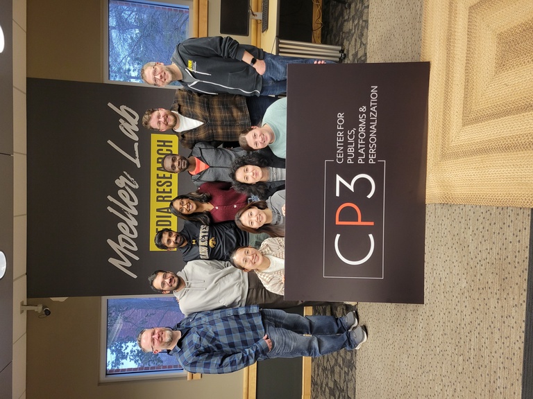 group posing with CP3 sign
