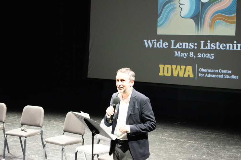 Luis Martin-Estudillo speaking on stage