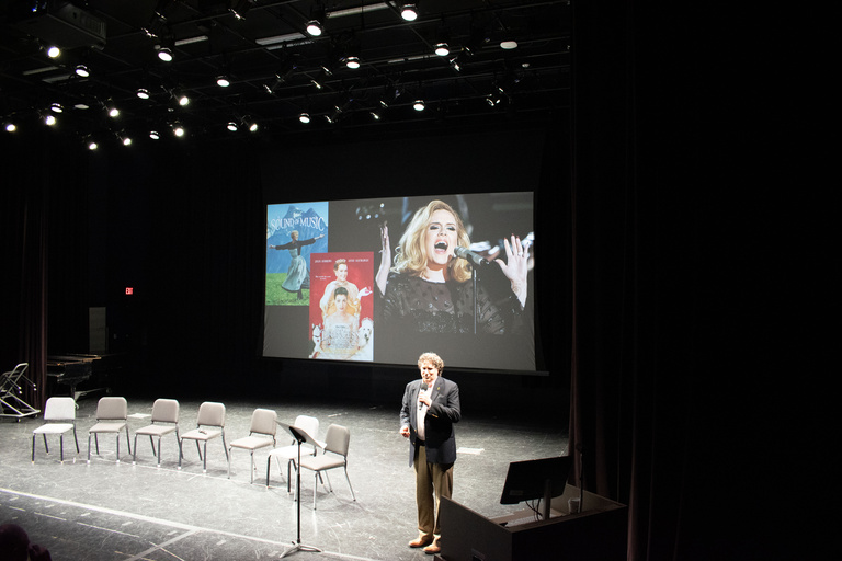 Eric Hunter speaking onstage