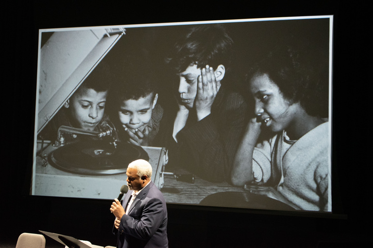 Damani Phillips speaking onstage