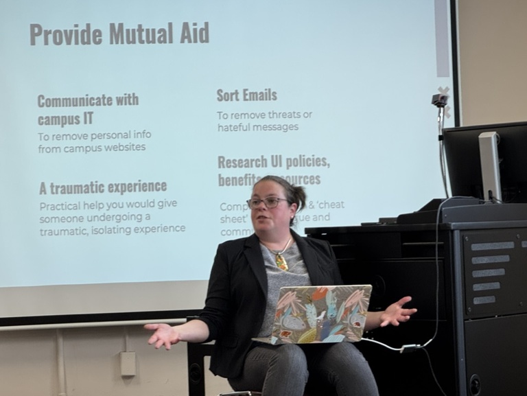 woman presenting with laptop
