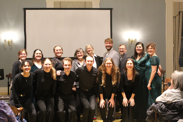 Group of music performers posing for a group snapshot