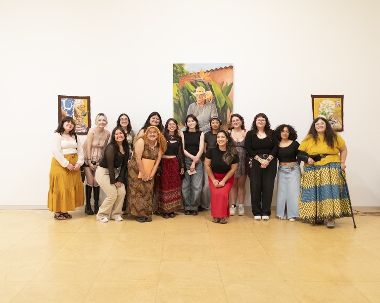 group posing at Art exhibition