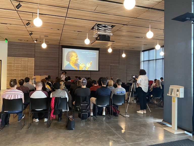 people listening to speaker