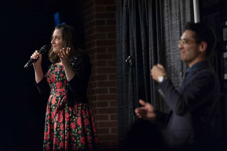 comic performing onstage