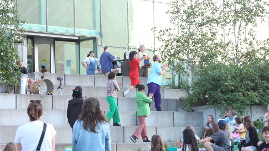 4 dancers performing in park